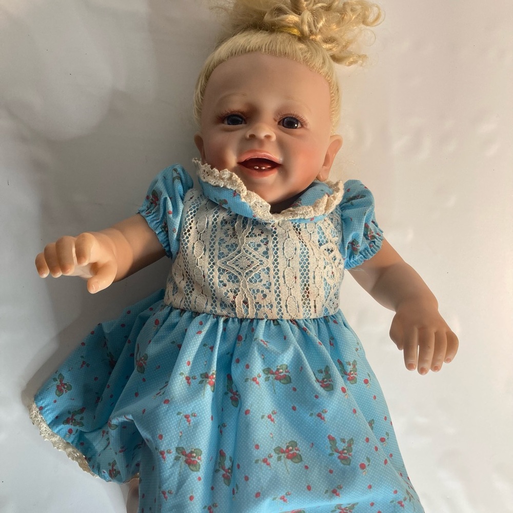 Reborn Yannick Lifelike girl babydoll blonde curly hair teeth